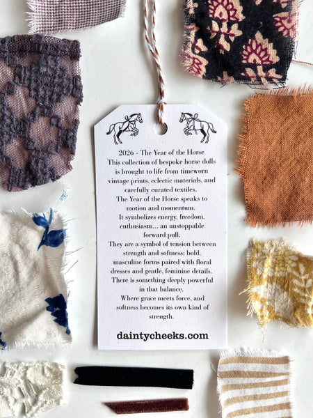 hang tag on horse dolls
