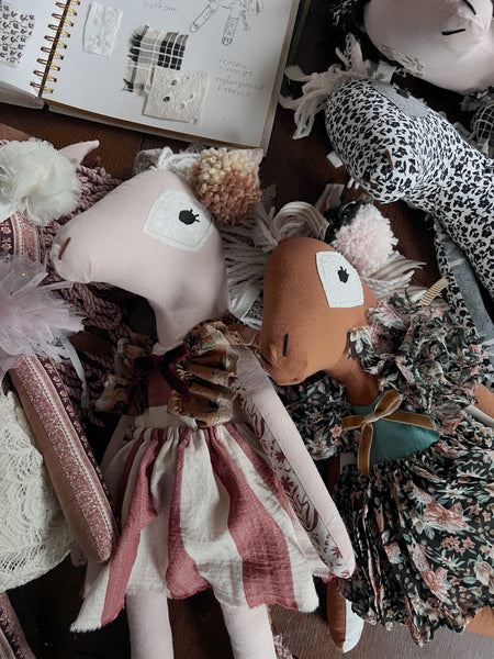 Two horse dolls up close 